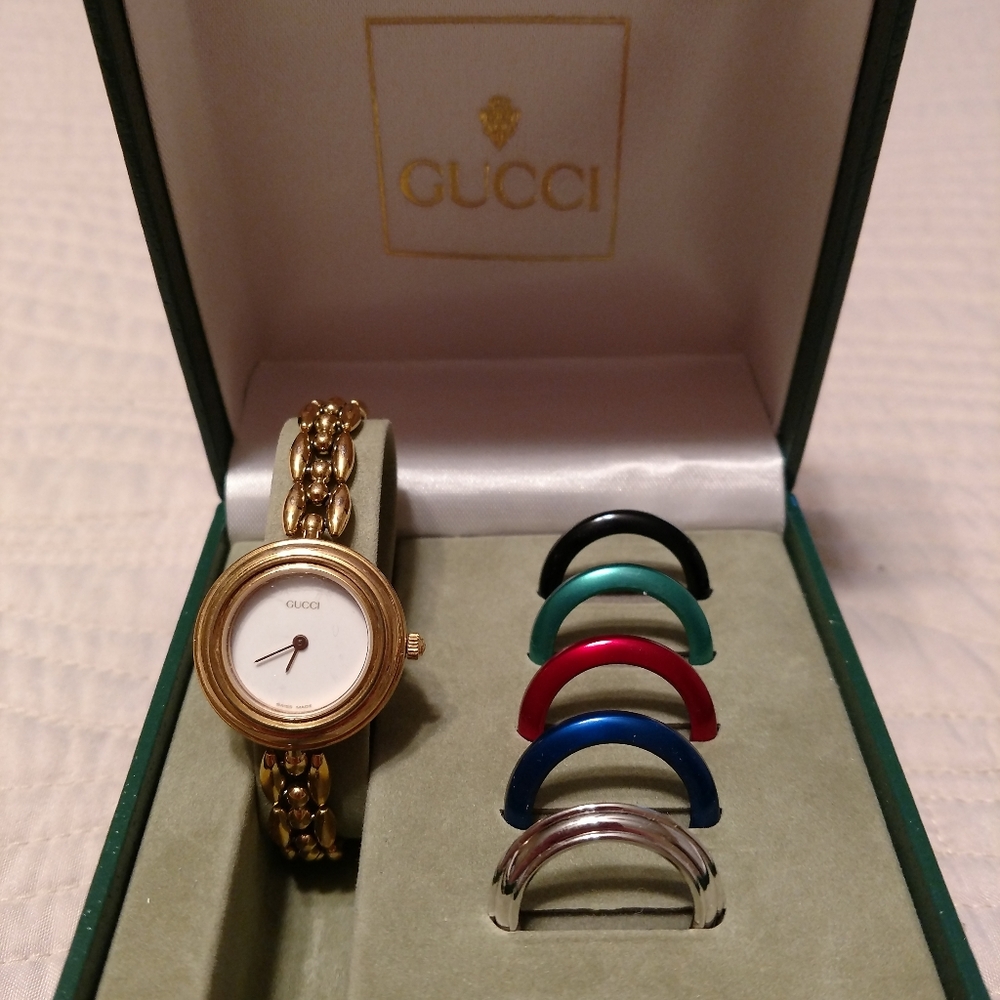 Gucci gold watch with 6 bezels